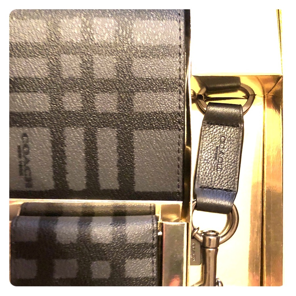 Men’s coach wallet never been used!